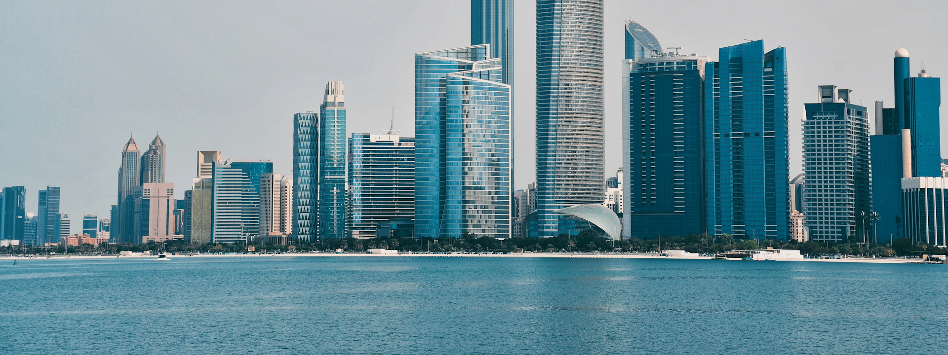 Abu Dhabi skyline across the water, where VP Furniture Movers provides local moving services