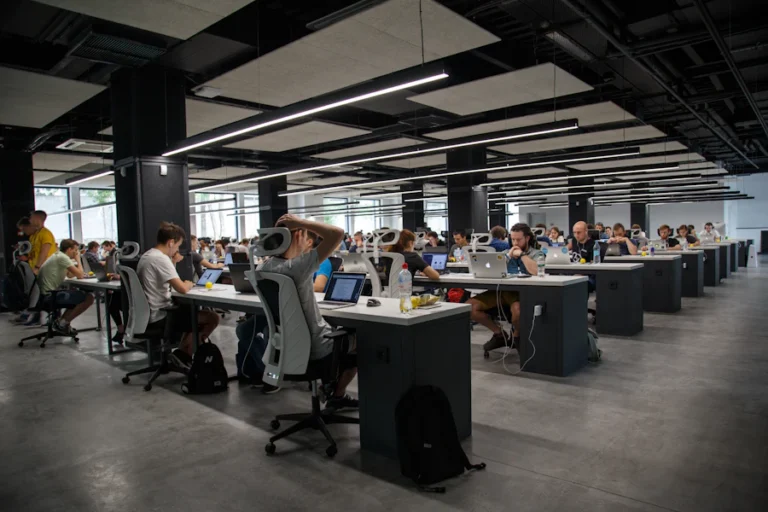 Large open-plan corporate office with many workstations for relocation