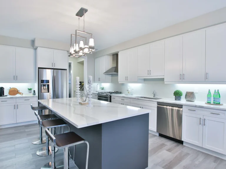 Bright kitchen with island and cabinets ready for kitchen packing