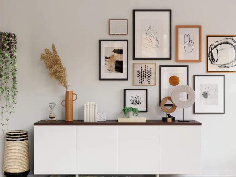 Picture frames and decorative items on a sideboard